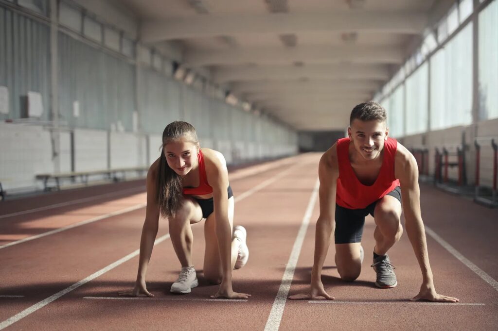 male female sprinter athlete