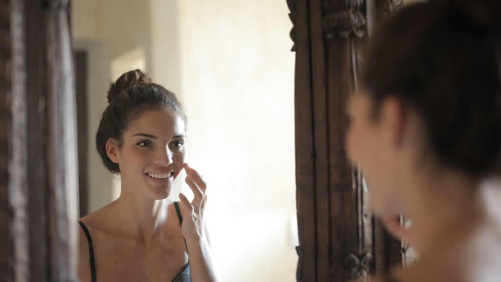 Woman Touching Her Cheek